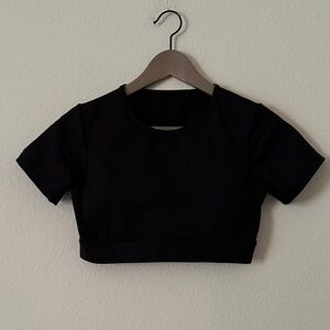 NVGTN crop top in black size medium sporty athletic workout gym open back